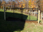 Black Chain Link Gate on Hill